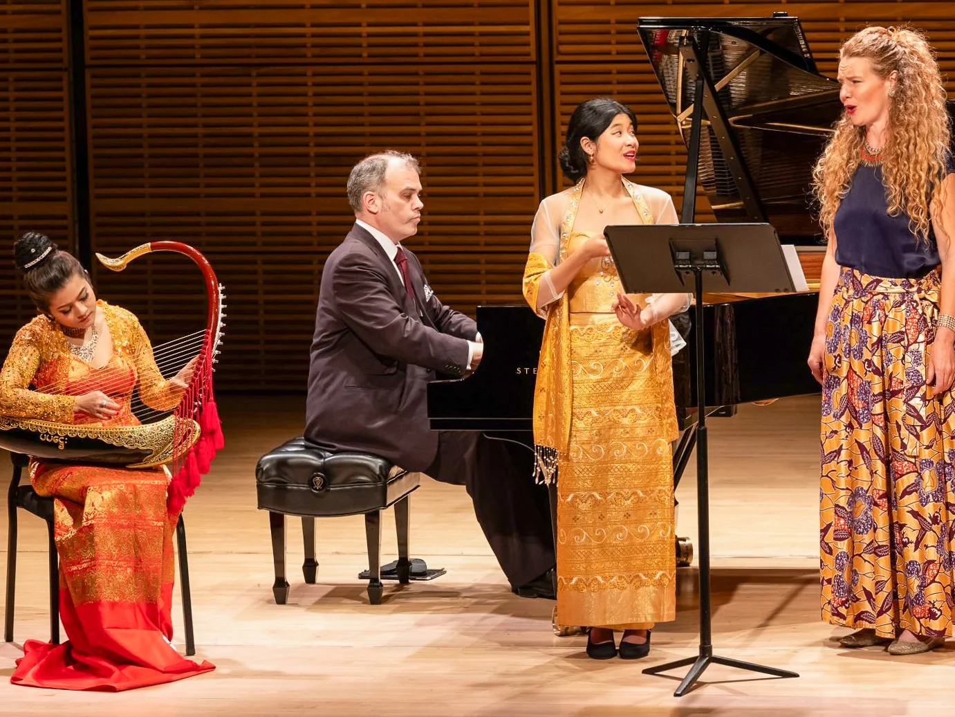 Piano, Burmese harp, and two vocalists performing together on the Zankel Hall stage
